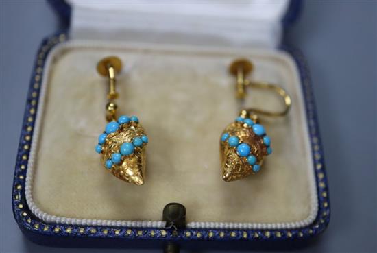 A pair of yellow metal (tests as 15ct) and turquoise set pear shaped drop ear clips, 17mm, gross 4 grams.